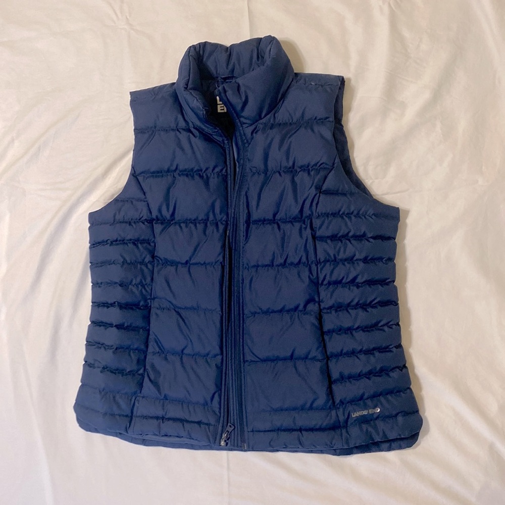 Blue zip up puffy vest